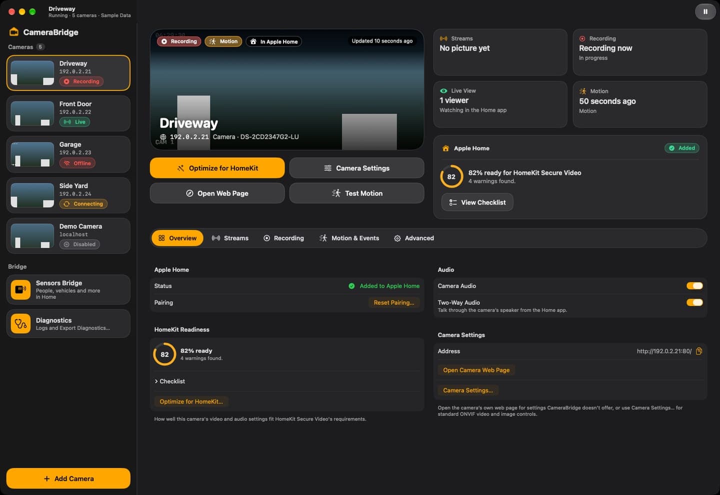 Camera detail view with HomeKit readiness, recording and motion status, using sample data